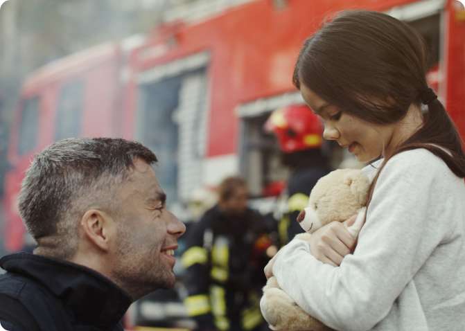 firefighter with young girl